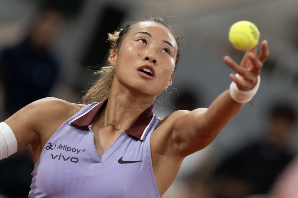 Zheng Qinwen celebrates victory over Victoria Mboko at Roland-Garros 2025, showcasing her match analysis skills.