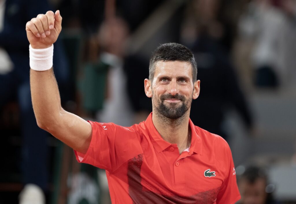 Novak Djokovic prepares for his match against Filip Misolic under the lights of Court Philippe-Chatrier.