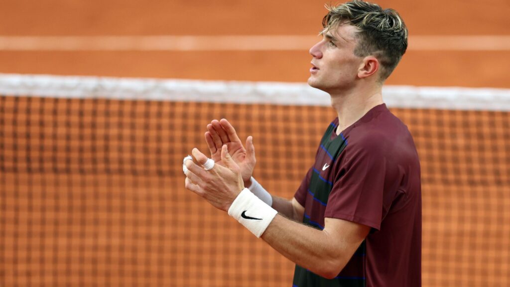 Jack Draper celebrates his victory over Joao Fonseca at the French Open, showcasing his impressive talent and determination.