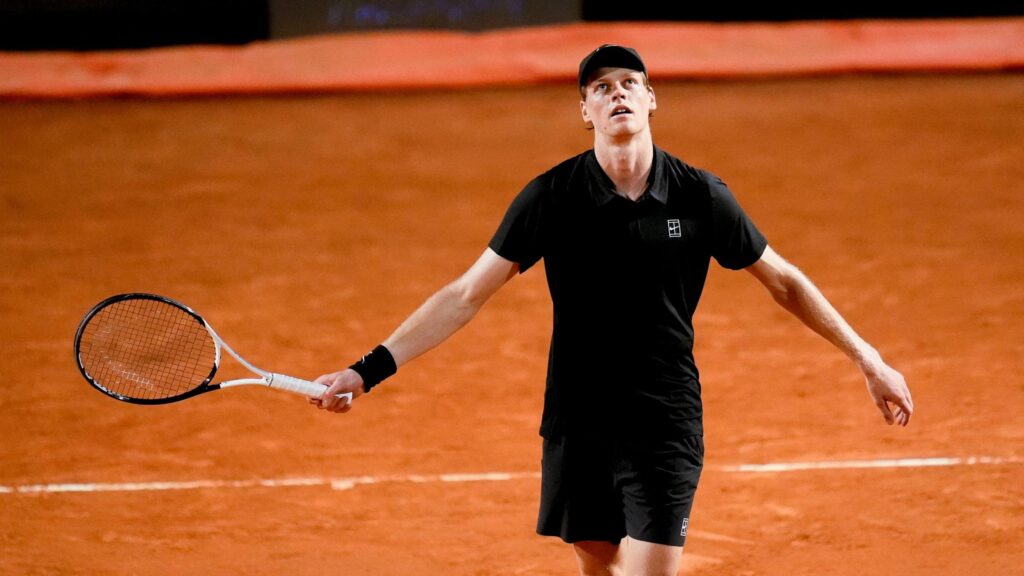 Jannik Sinner celebrating his victory at the Italian Open, showcasing his dominant form and relentless drive.
