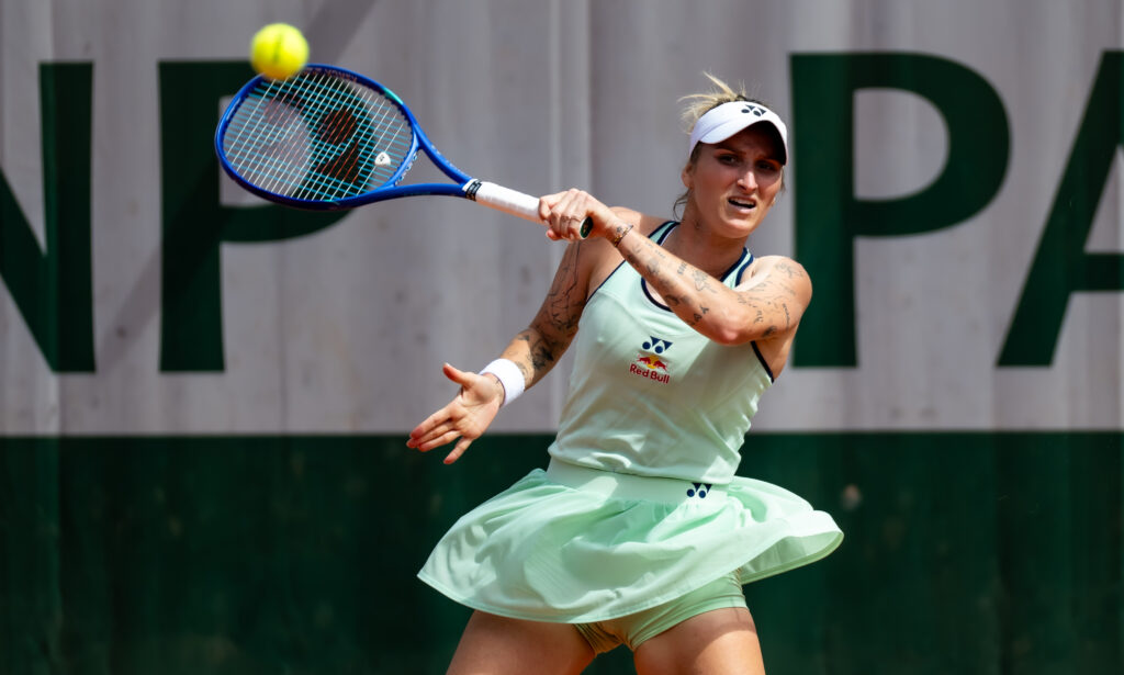 Marketa Vondrousova celebrates her victory in three sets at Roland Garros, advancing in the tournament.