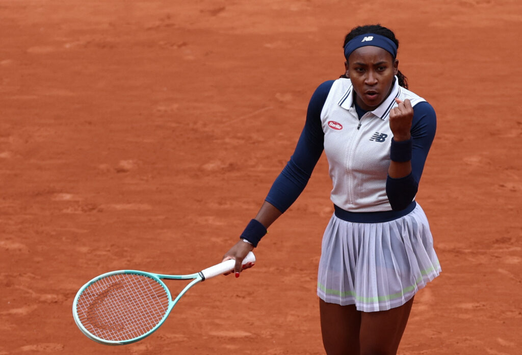 Coco Gauff breaks Marie Bouzkova's serve during their match at the French Open, showcasing her early dominance.