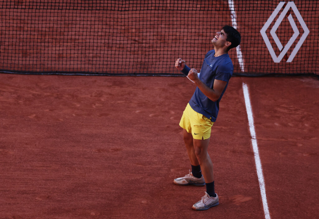 Jannik Sinner and Carlos Alcaraz compete at the French Open, showcasing their speed and skill on the court.