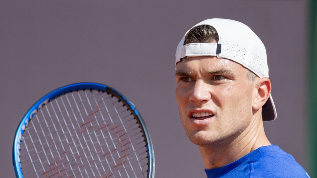 Jack Draper practicing on clay at Roland Garros, showcasing his impressive skills and determination as a rising tennis star.