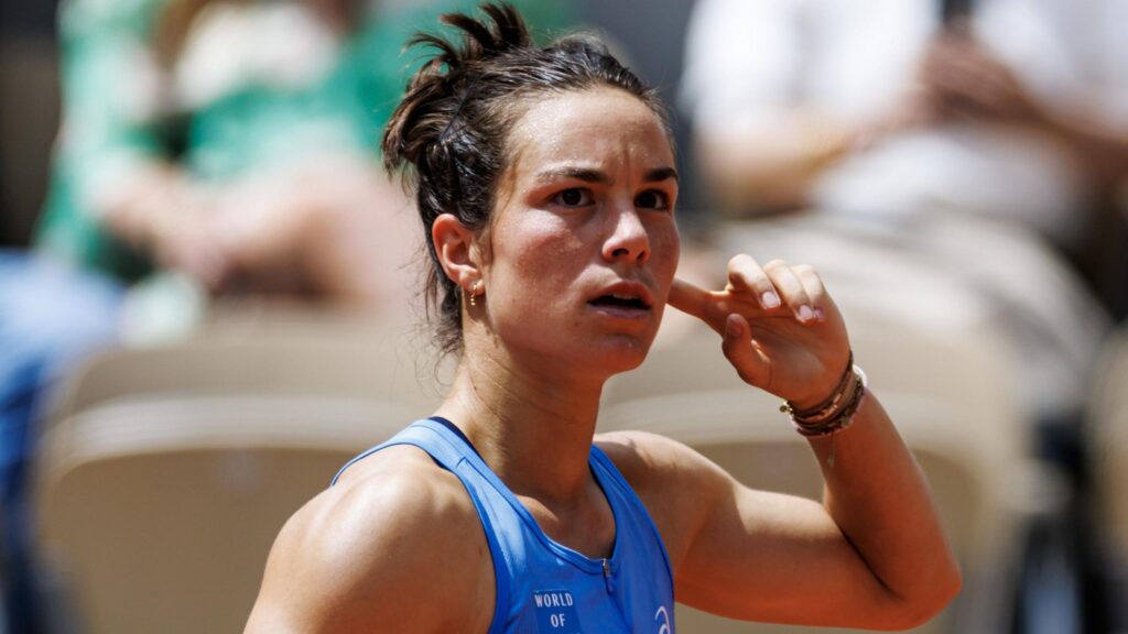 Lois Boisson celebrates her shocking victory over Jessica Pegula in the French Open quarter-finals.