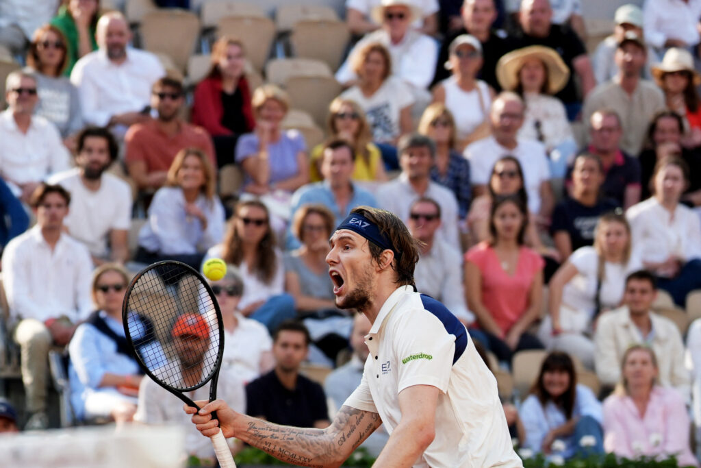 Alexander Bublik celebrates his victory over Jack Draper at the French Open, showcasing impressive performance.