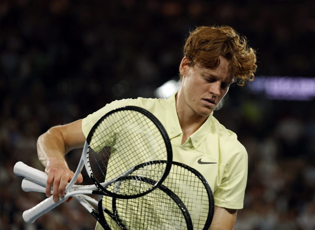 Jannik Sinner analyzing tactical changes post-victory over Andrey Rublev at the French Open.