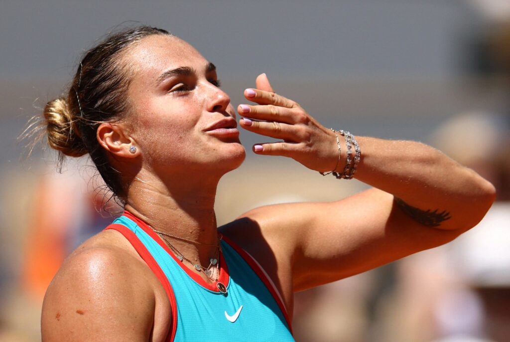 Aryna Sabalenka laughs at Novak Djokovic's playful imitation of her victory poses at the French Open.