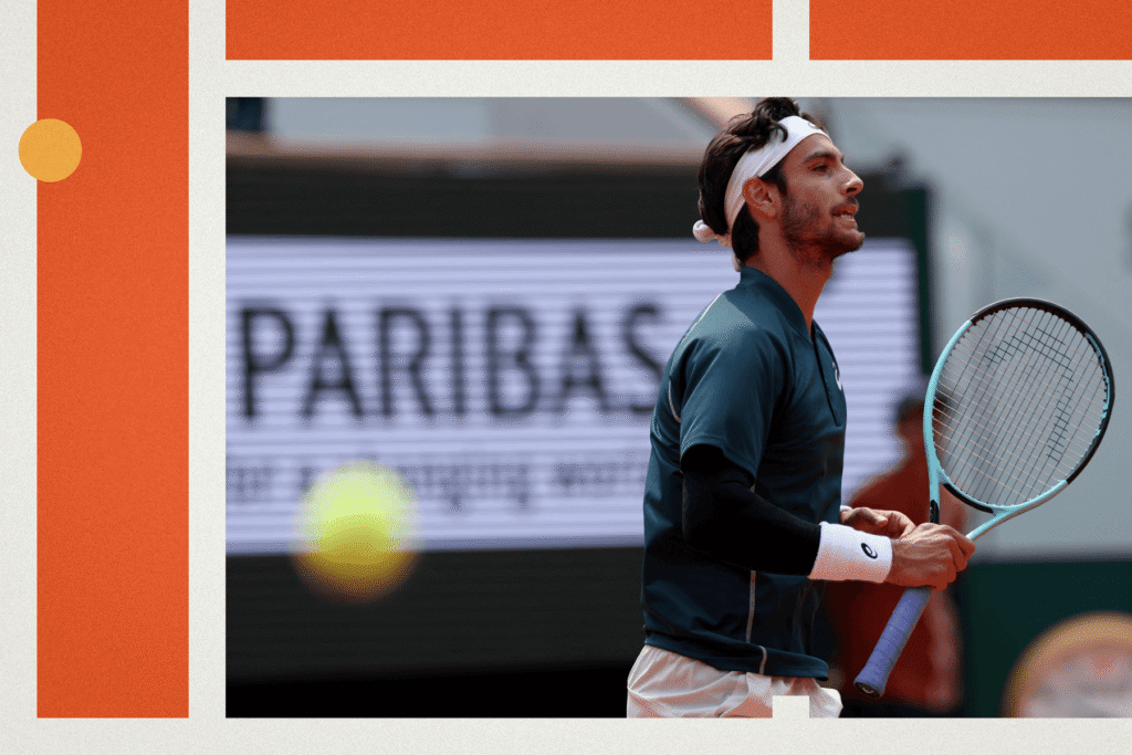 Lorenzo Musetti showcasing his elegant backhand during a match at the French Open 2025.