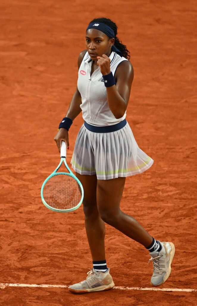 Coco Gauff celebrates her victory over Madison Keys at Roland Garros, advancing to the semifinals in Paris.