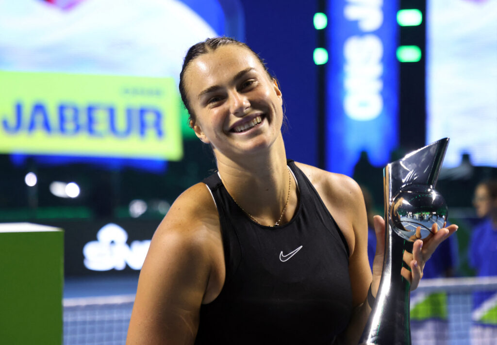 Aryna Sabalenka celebrates her French Open semi-final win, advocating for equal opportunities for women in tennis.