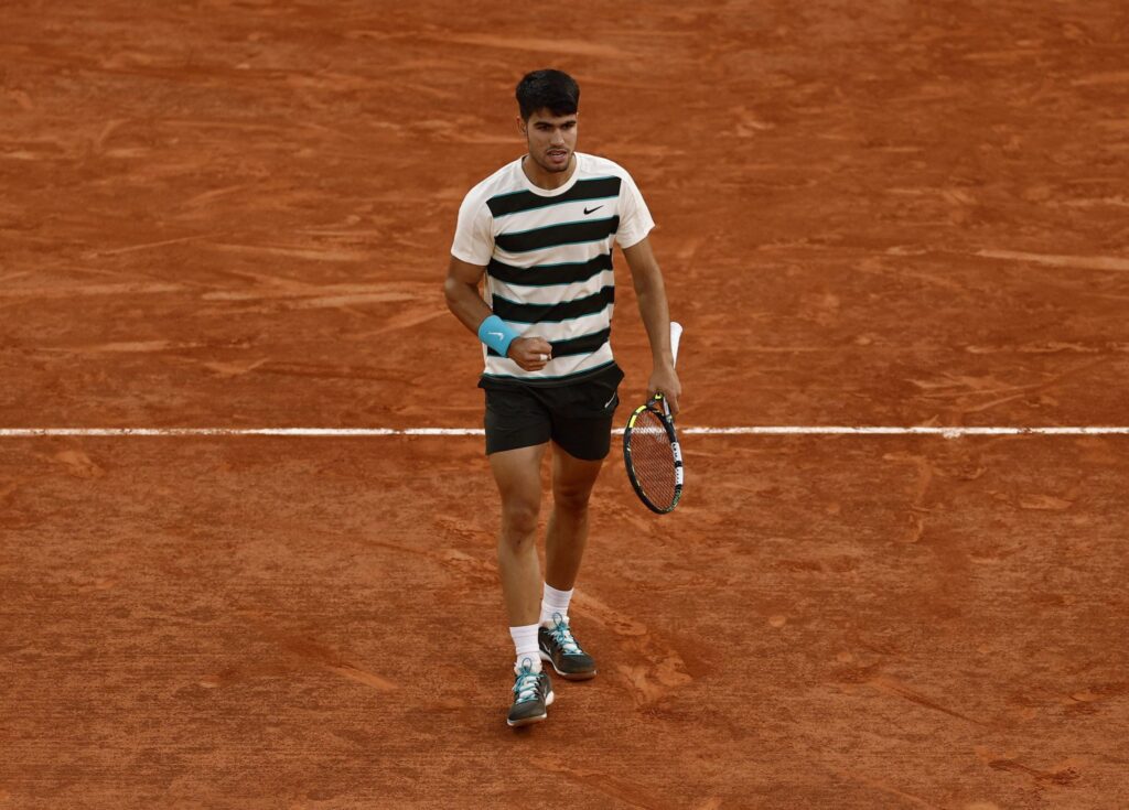 Carlos Alcaraz and Lorenzo Musetti prepare for their exciting semi-final match at the French Open 2025.