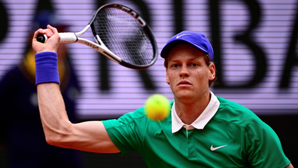 Jannik Sinner smiles in celebration after his quarter-final win, anticipating a 'special' semi-final at Roland-Garros.