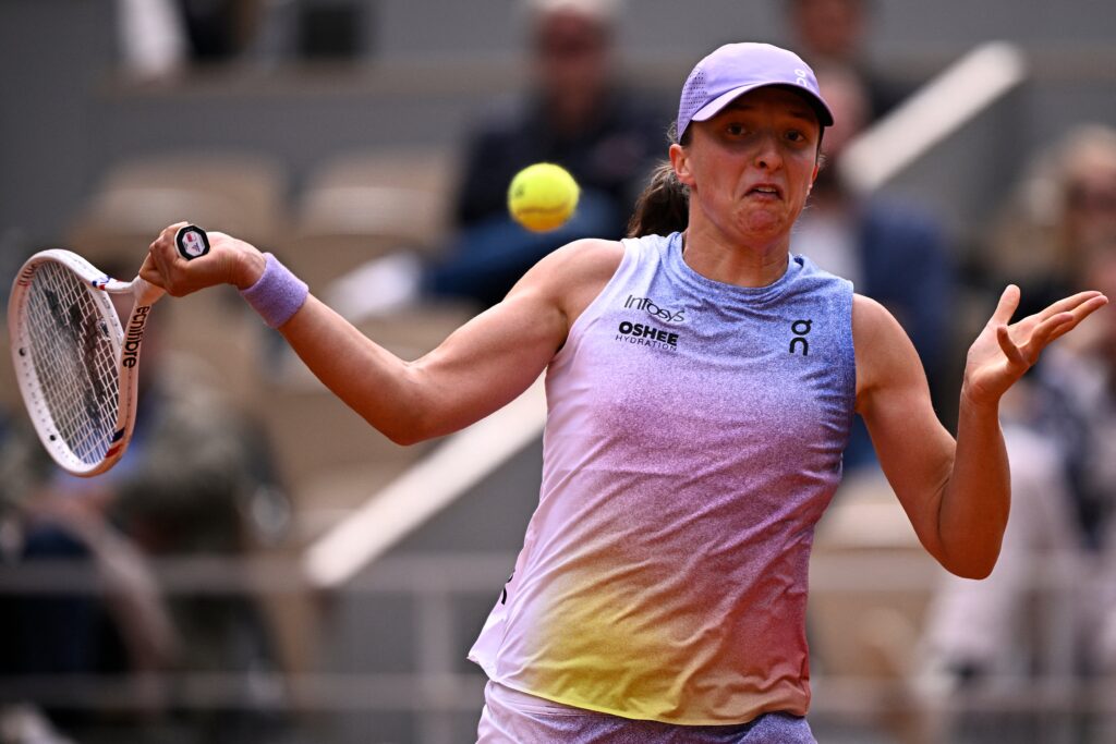 Fans passionately debate Swiatek vs. Sabalenka predictions at Roland-Garros, showcasing excitement for the upcoming semi-final.