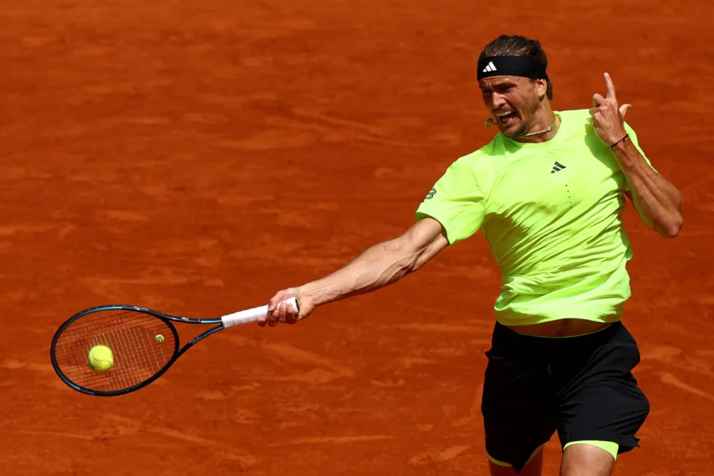 Zverev narrowly misses a crucial shot, giving Djokovic an advantage in their quarter-final match at the 2025 French Open.