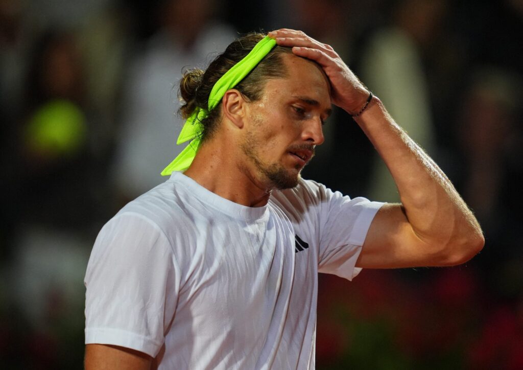 Alexander Zverev reacts during the French Open 2025 match after an unexpected incident involving a fly.