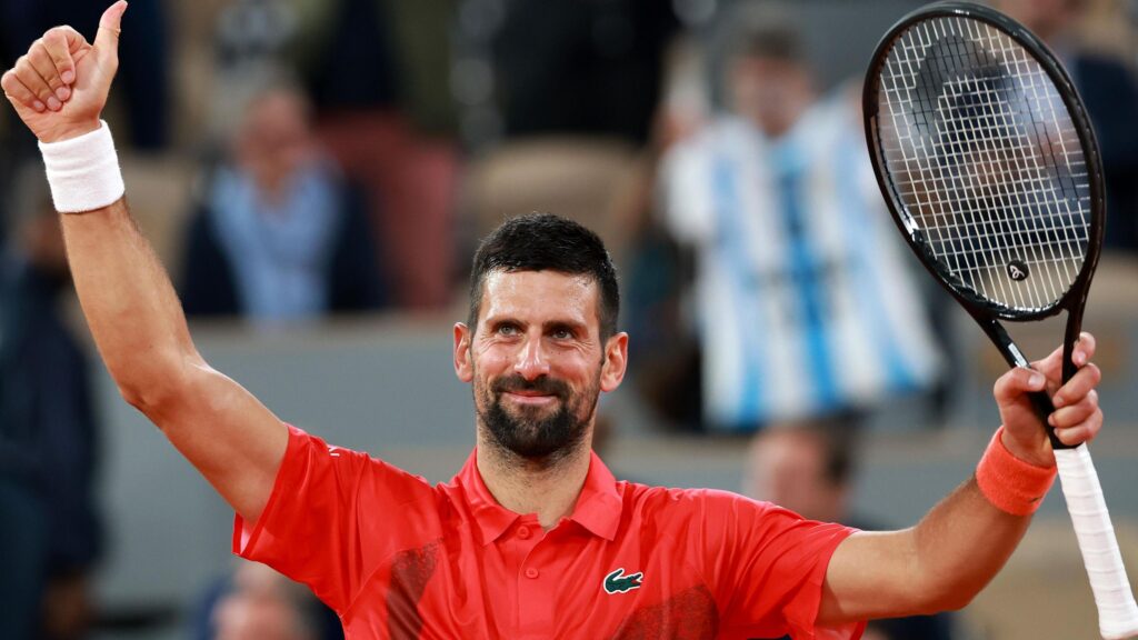 Novak Djokovic celebrates his victory at the 2025 French Open against Alexander Zverev in a thrilling match.