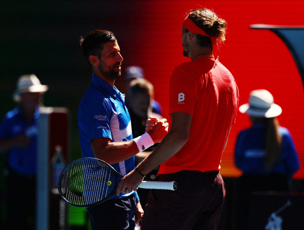 Alexander Zverev and Novak Djokovic in action during the 2025 French Open quarter-final match.