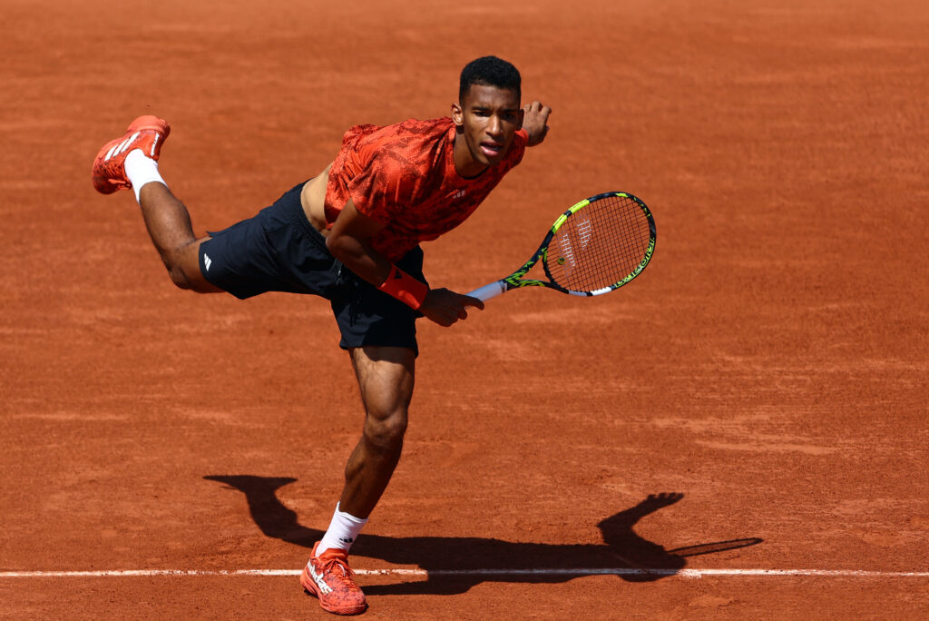 Felix Auger-Aliassime reflects on his French Open experiences, including matches against Nadal and memories of Roland-Garros.