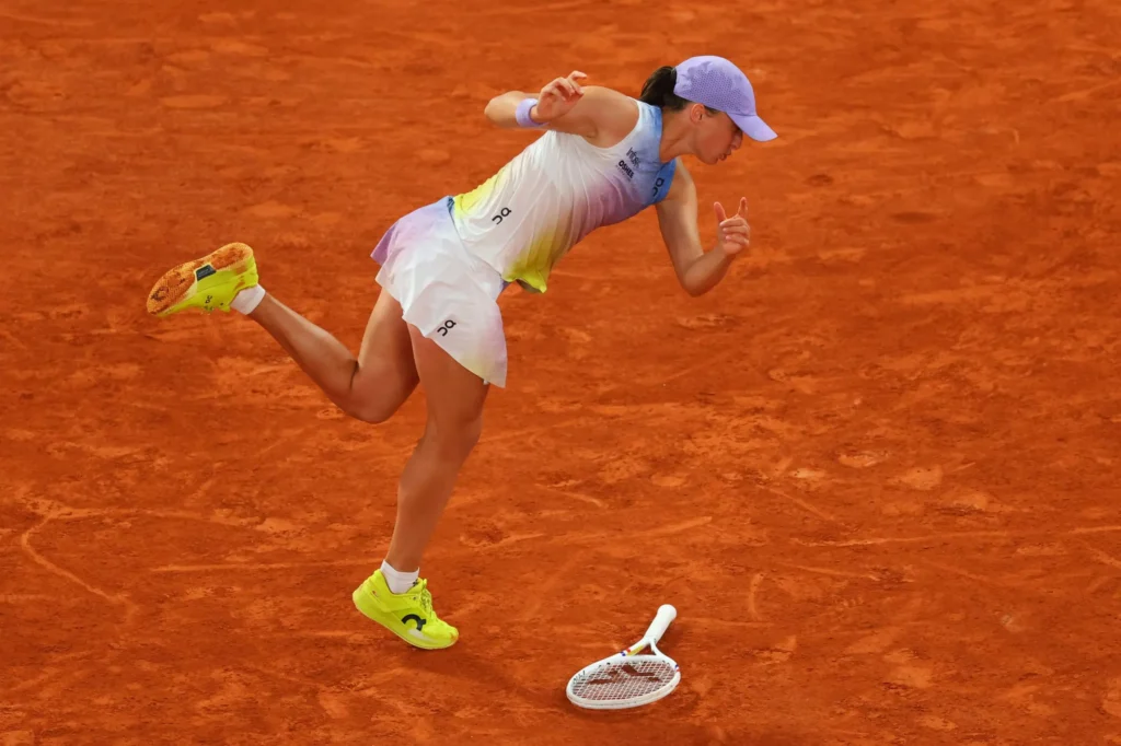 Iga Swiatek gestures in frustration during the umpire controversy at her French Open semi-final against Aryna Sabalenka.