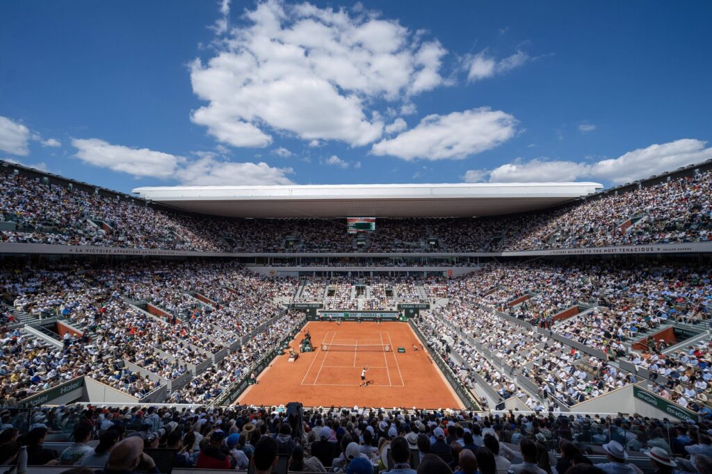 Iga Swiatek reacts in frustration during a controversial call at the French Open semi-final against Aryna Sabalenka.