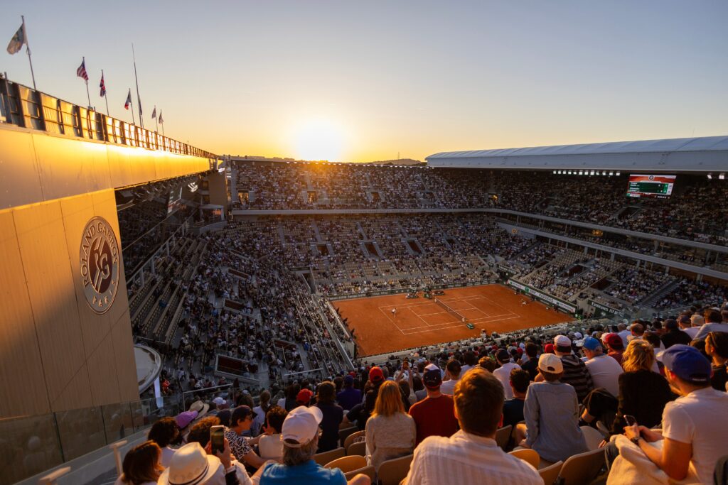 Coco Gauff and Lois Boisson compete in the French Open 2025 women's singles semi-final on Court Philippe-Chatrier.