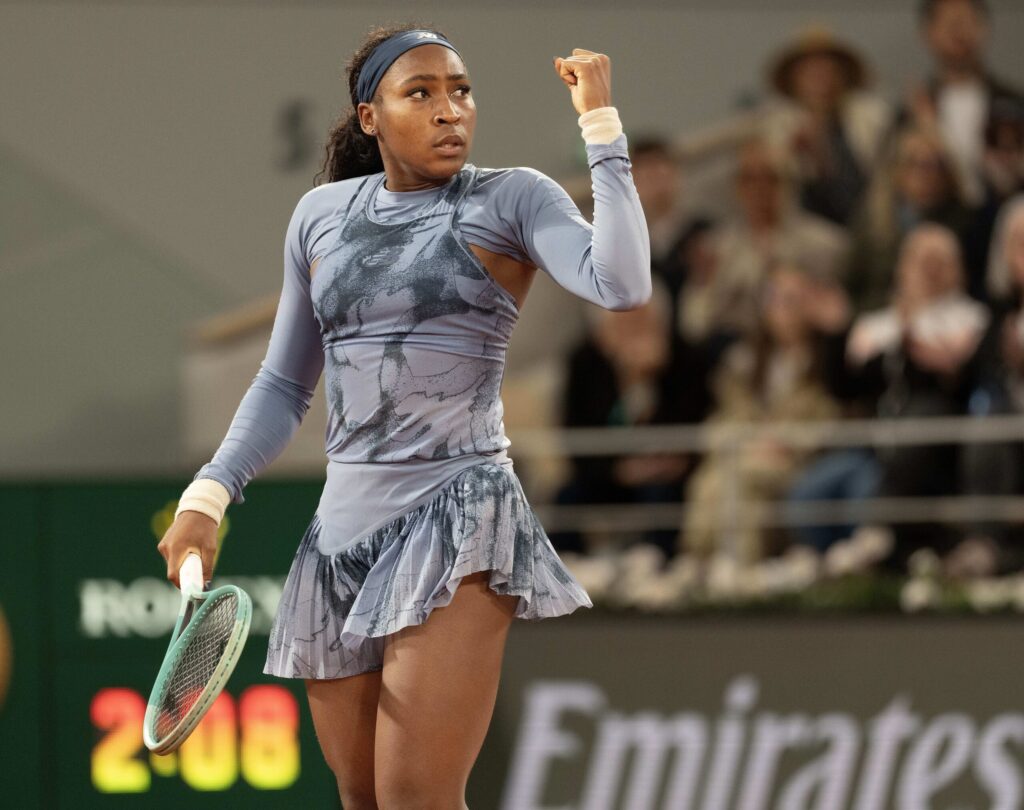 Coco Gauff celebrates winning the opening rally against Lois Boisson in the French Open 2025 semi-final.