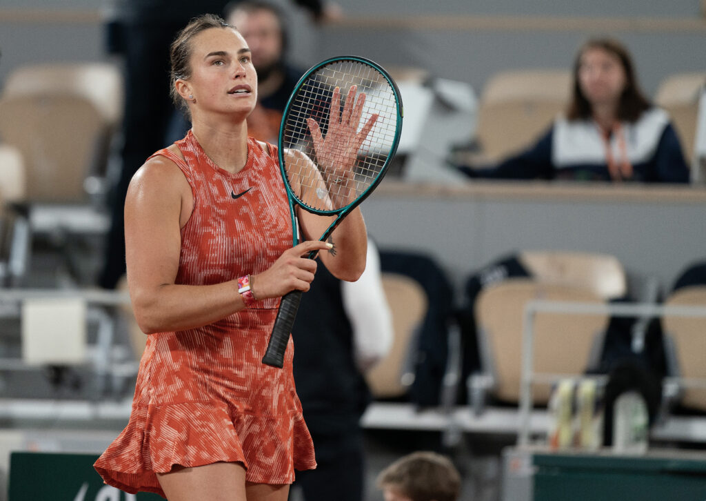 Aryna Sabalenka celebrates her victory at the French Open, showcasing her impressive skills against Iga Swiatek.